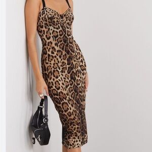 Leopard Print Bodycon Dress very similar To. Dolce Gabbana X Skims Dress 
Adjust